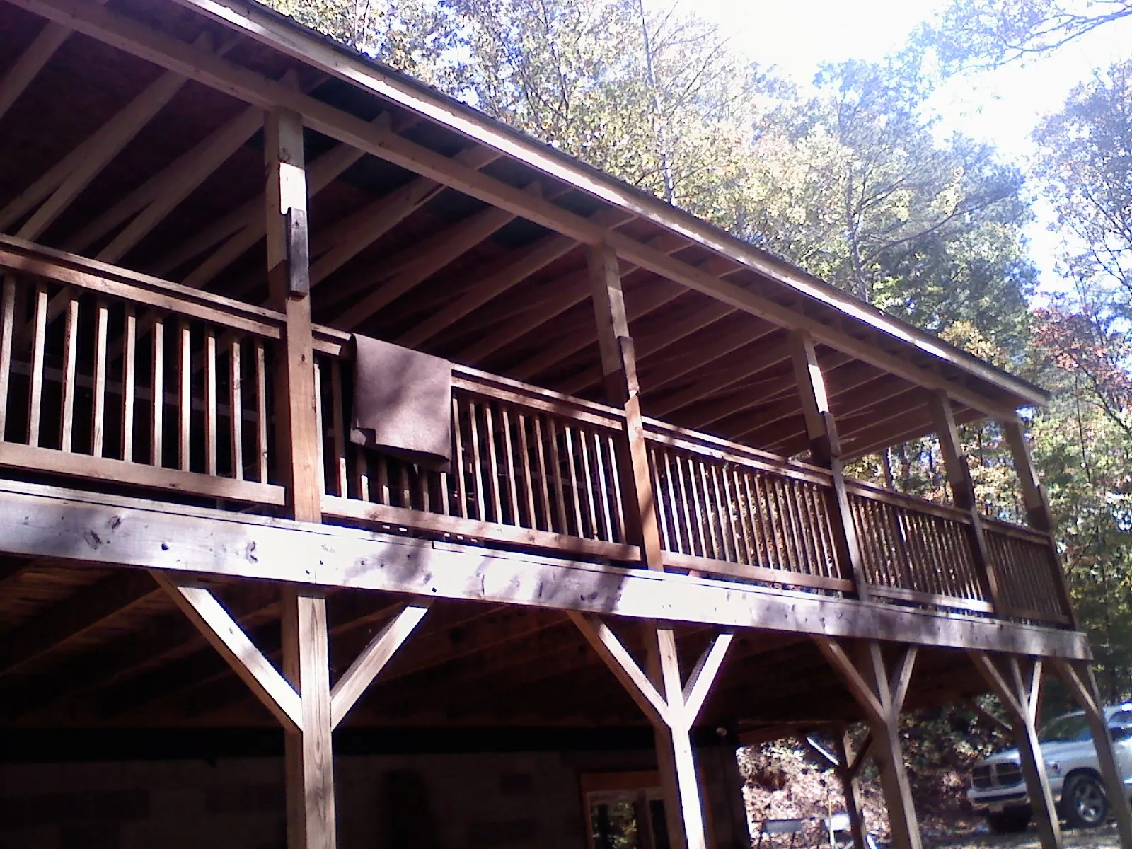 Timber framing under a new elevated porch and deck — Roof Leak Repair in Toluca by Roofing Brothers